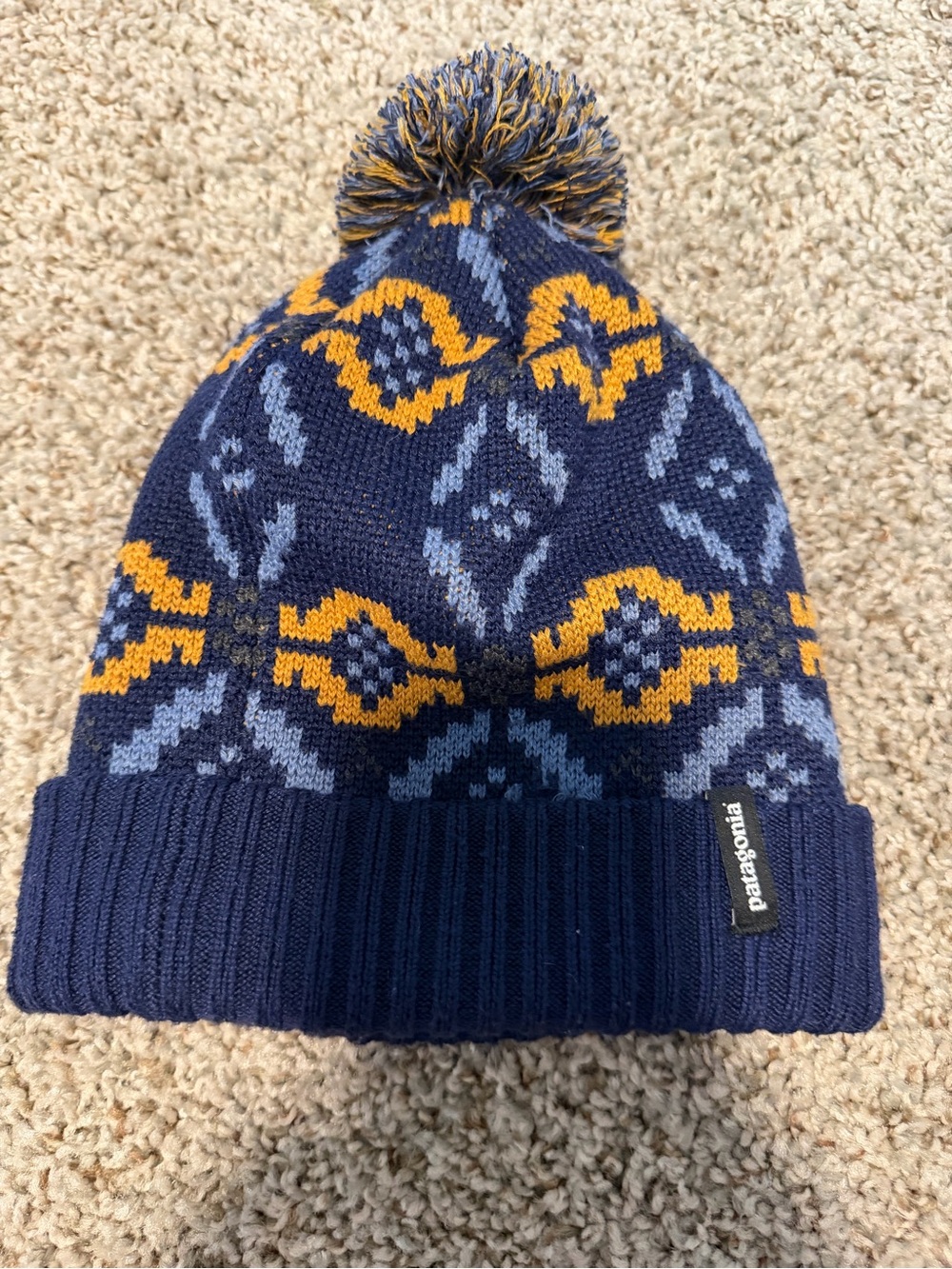Patagonia Kids Navy Beanie with Yellow and Light Blue Pattern Pom